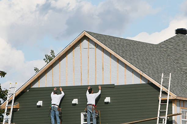 Professional Siding technician working in Somerset, VA